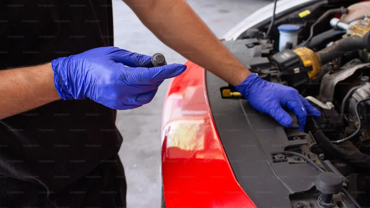 Close-up of ceramic coating application showing the glossy reflective surface