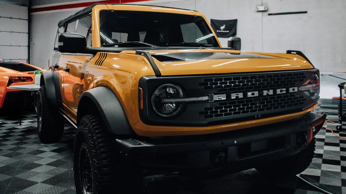 Professional window tint installation bay with proper lighting and climate control equipment