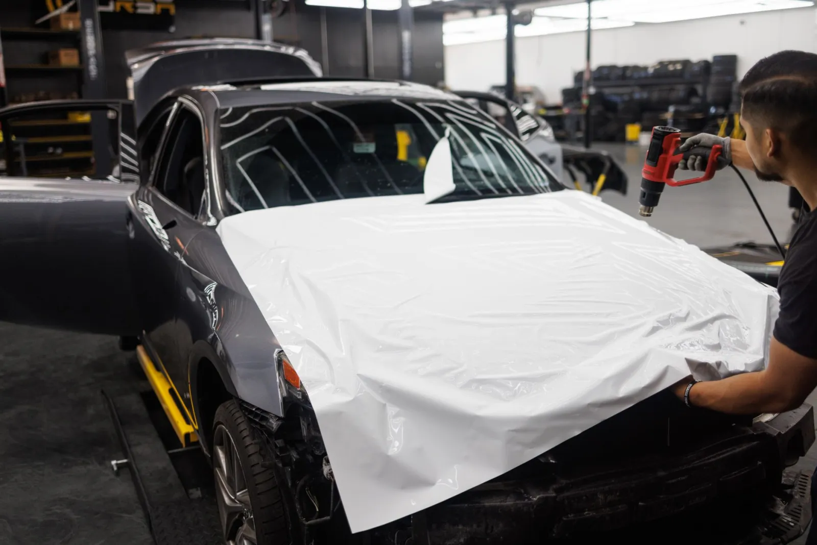 close-up of paint protection film edge on a vehicle hood