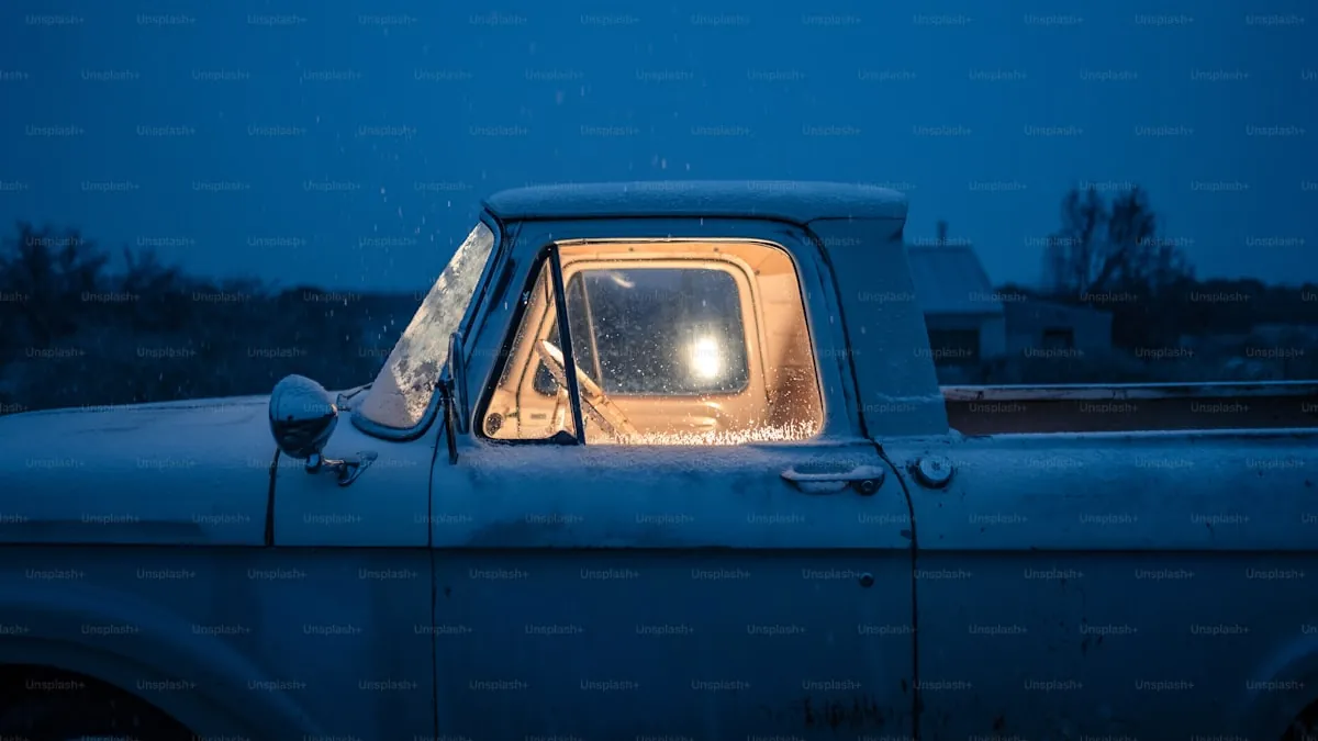 Truck driving on a Texas ranch road kicking up gravel