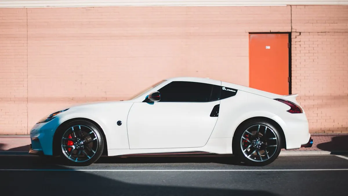 Professional window tint installation in progress on a vehicle at EuroLuxe Detailing in Tomball Texas