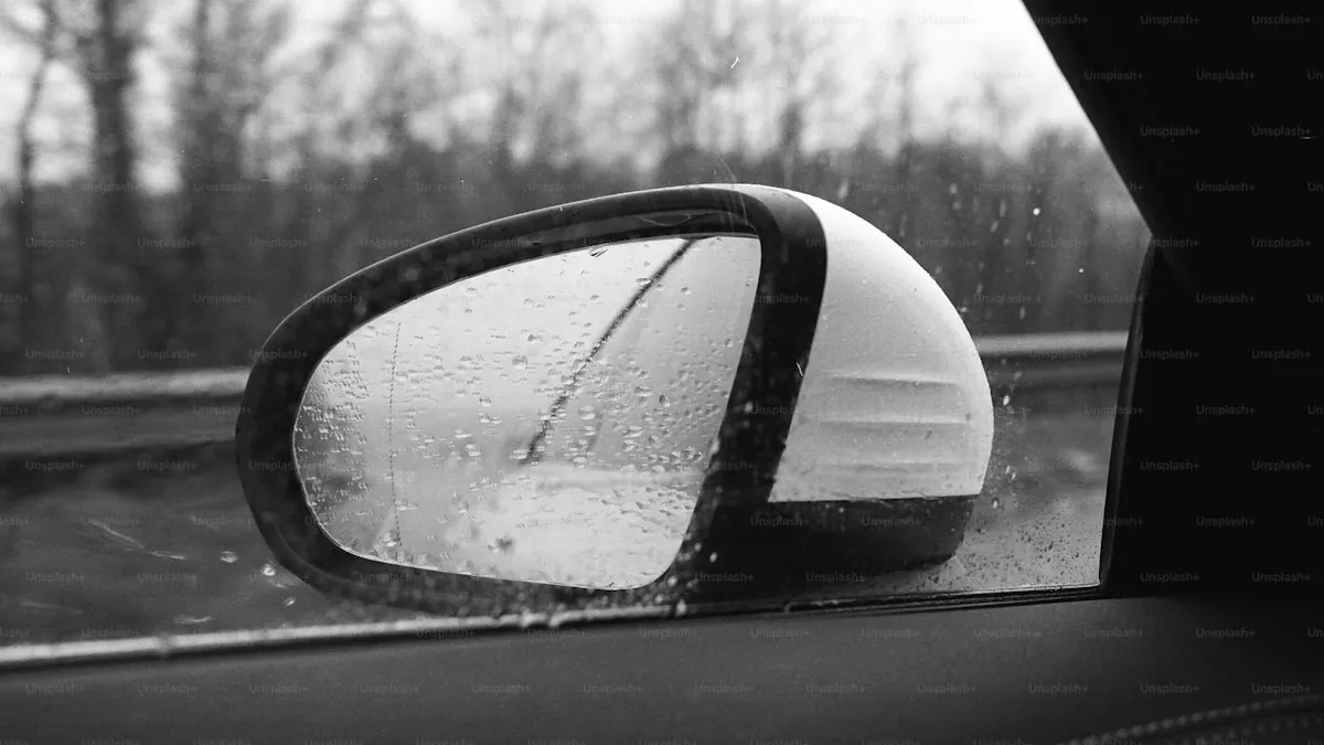 close-up of vehicle side window showing deep charcoal window tint film